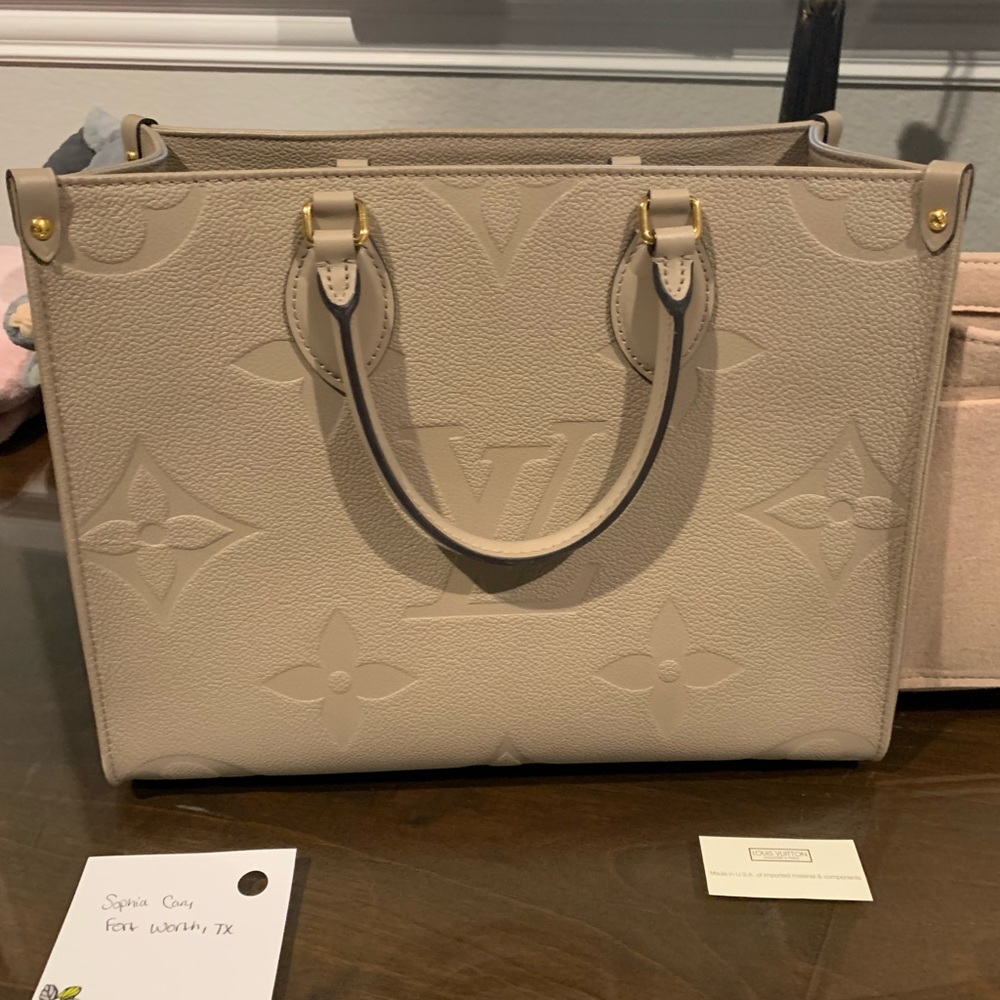 ONTHEGO MM EMPREINTE (TOURTELLE/TURTLEDOVE)